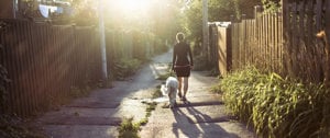 Woman walking with dog