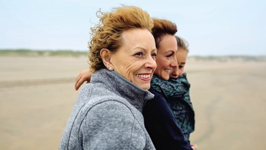 three generations of women in the wind