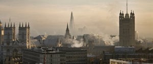 A stunning aerial perspective of London, featuring its historic buildings and vibrant cityscape from a rooftop vantage point.