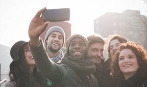 Group of friends taking a selfie photo